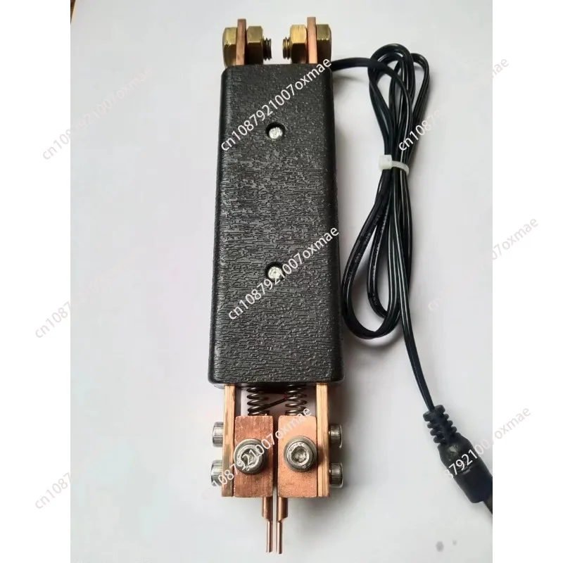 

Portable hand-held spot welding pen with built-in spring 18650