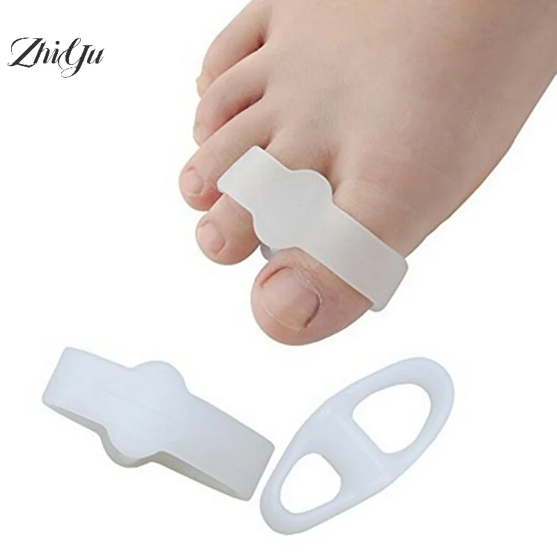 2 ชิ้นซิลิโคนเจล Toe Straightener Separator Bunion Corrector บรรเทาอาการปวดเท้าเครื่องมือดูแล