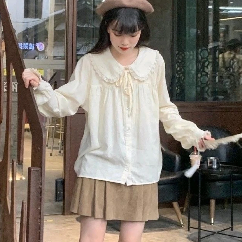 

Женская одежда во французском стиле, милая кукольная рубашка с кружевным воротником, весна-осень, ленивый стиль, шикарная свободная блузка, модный повседневный топ на шнуровке