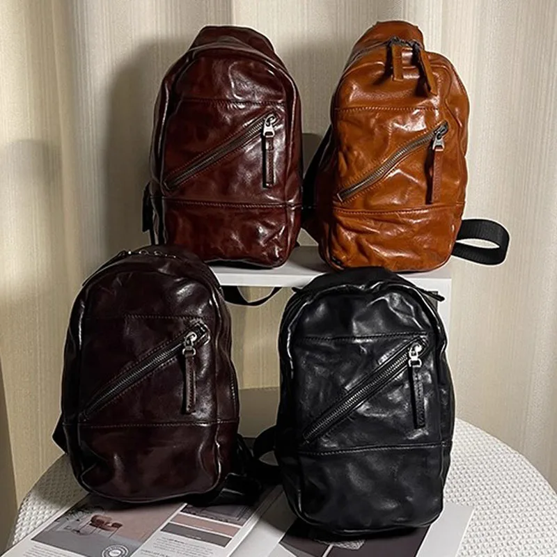 AETOO Leather single-shoulder bag for both men and women, fashionable and trendy, large-capacity casual backpack, top layer cowh