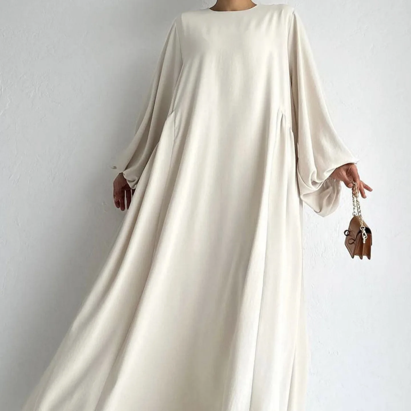 دبي فساتين مسلمة متواضعة مطوي بلون عباية إسلامية بأكمام منتفخة فستان طويل امرأة عبايات عصرية إسلامية