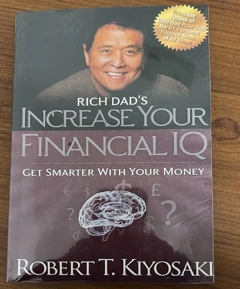 Rich Dad's Aumente el QI financiero sea más inteligente con su dinero Libro de bolsillo en inglés
