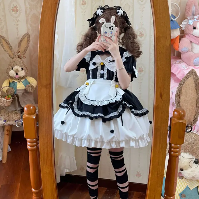 Kawaii urocza Lolita kokarda kostiumy pokojówka Cosplay kwiatowy pączek dziewczyna pokojówka strój dla kelnerki imprezowe kostiumy sceniczne