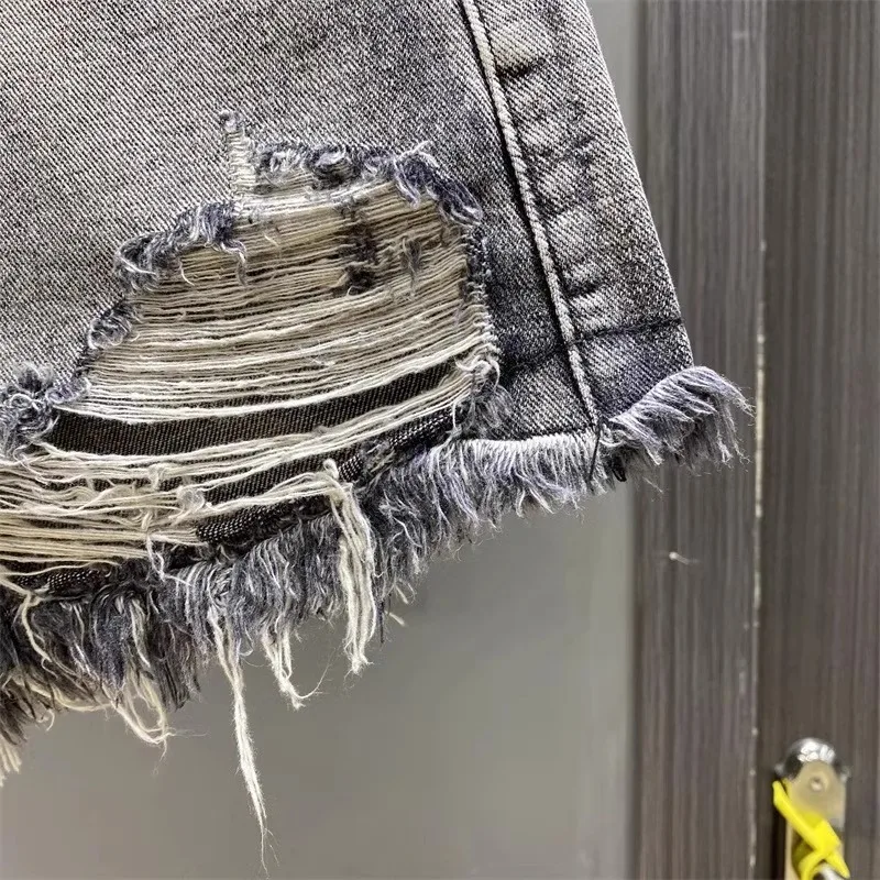 Worn Legs with Rough Edges Washed Black Denim Shorts 2026 Summer New Women Fashion A-line Wide Leg Hole Ripped Denim Shorts
