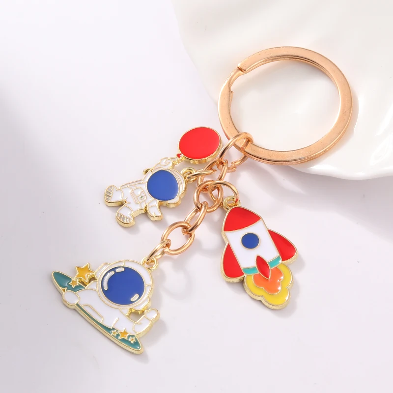 Cute Astronauts Keychains Space Rockets Moon Satellite Enamel Key Rings For Women Men Astronaut Friendship Gift Handmade Jewelry