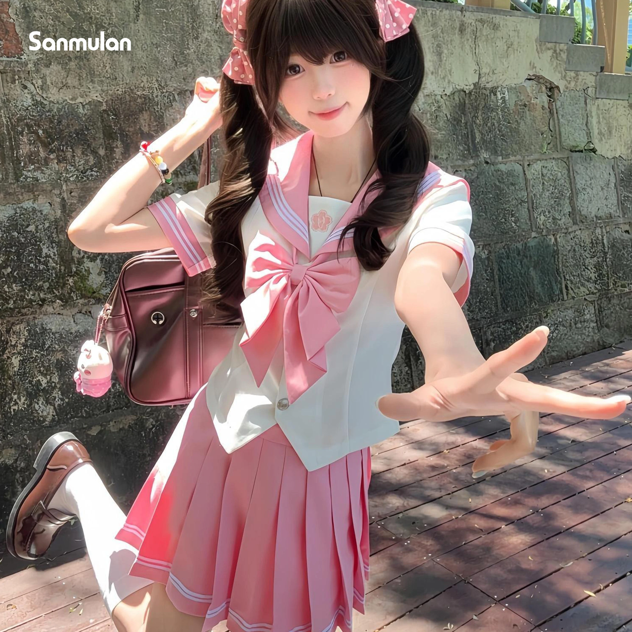 日本と韓国風のピンクのjk制服半袖セーラー服、キュートな女子高生風の衣装、ウエストが絞られたデザイン。