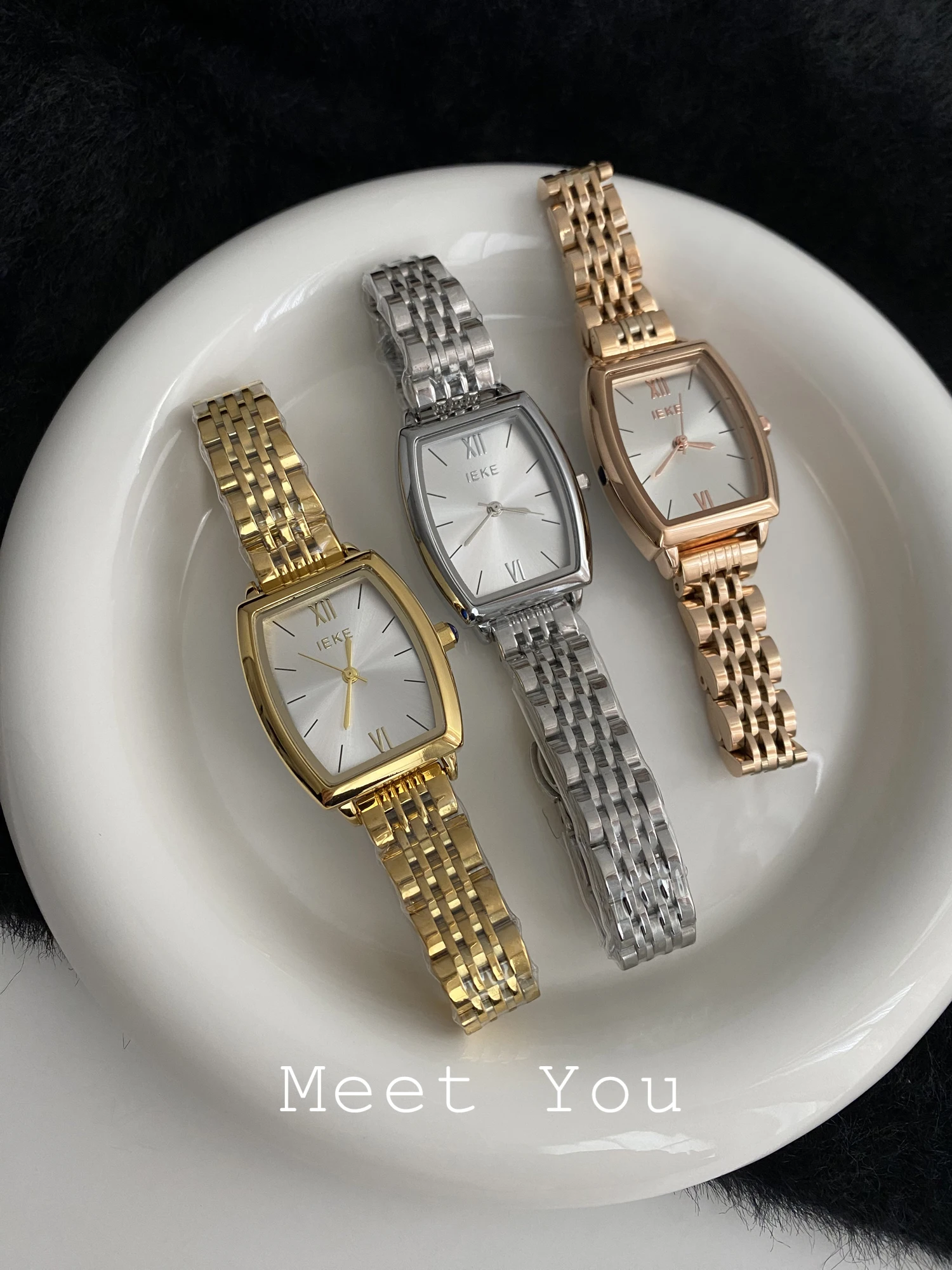 Asophisticatedminimalist Koreanstyle women's watch with a barrelzhapeddesign and a steel strapA unique timepiece gift for ladies