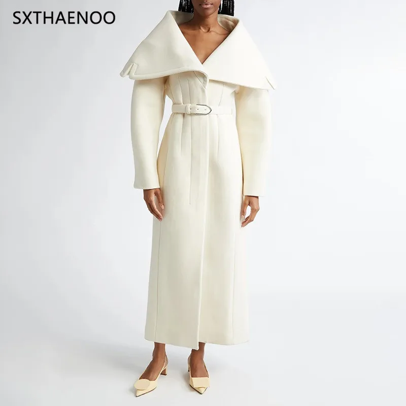 

Женское элегантное пальто SXTHAENOO: шикарное, свободное, с отложным воротником, на одной пуговице, с поясом, длинное. Модная уличная одежда для осени и зимы 2026.