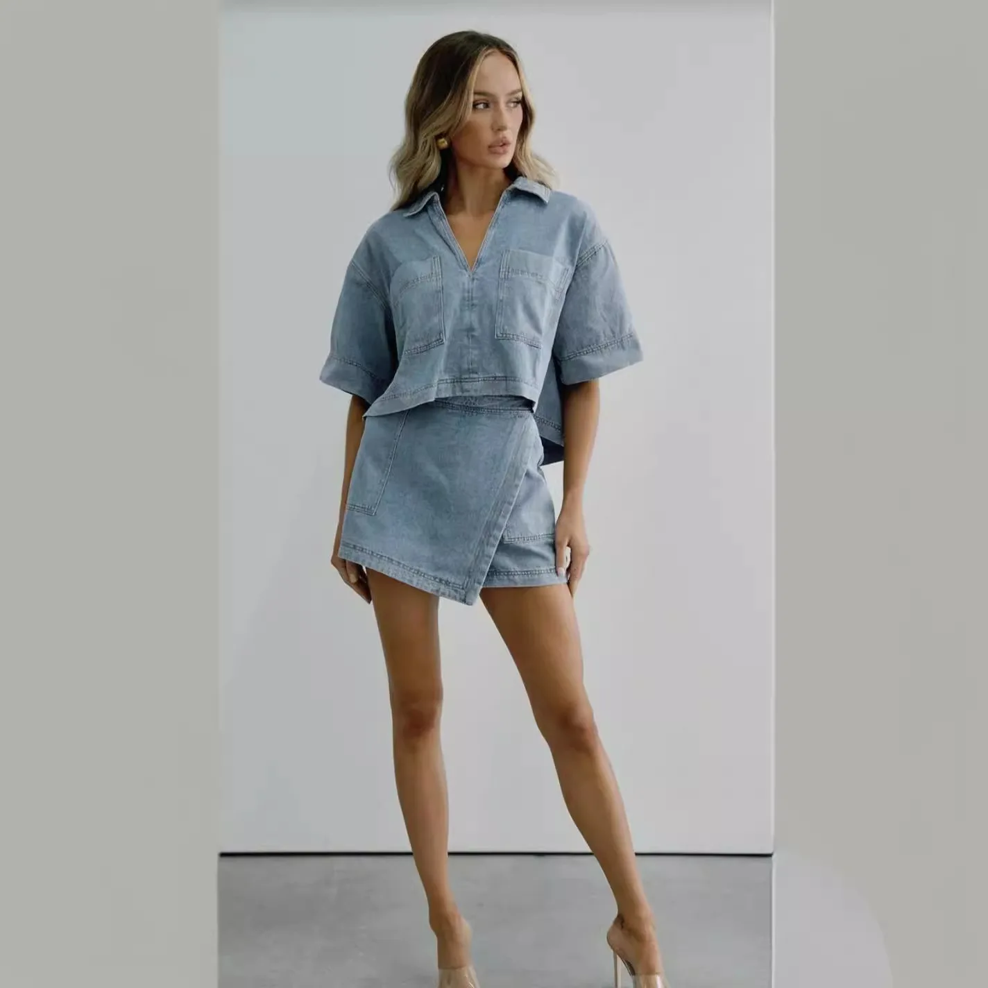 2024 Summer Women Blue Denim Skirt Suit Loose 2-częściowy zestaw z krótkim rękawem z kieszenią i nieregularną spódnicą dla kobiet Street Out