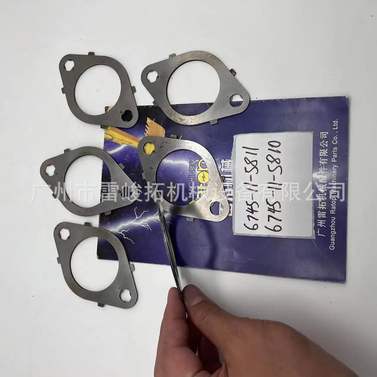 

Экскаваторный погрузчик инженерное Дело запасные части оборудования 6745-11-5810 Прокладка выхлопной трубы 6745-11-5811