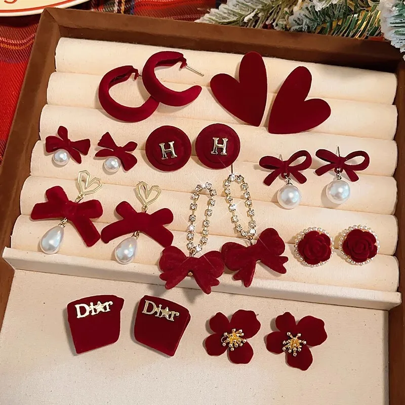 الأحمر احتفالي السنة الجديدة الزفاف المرأة الأقراط الراقية شخصية انخفاض الأقراط شكل قلب زهرة شكل فراشة عقدة الشكل