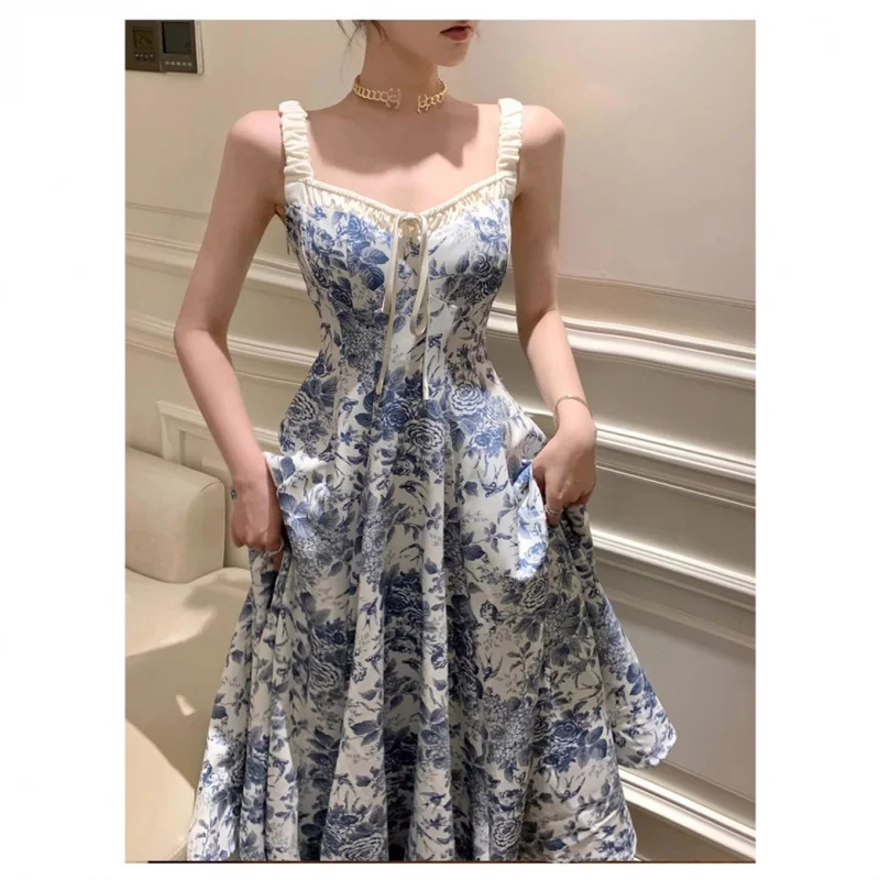 

2025Spring and Summer New French Style Floral Retro Elegant Spaghetti Strap Dress for Women with Draped Large HemvMid-length Dre