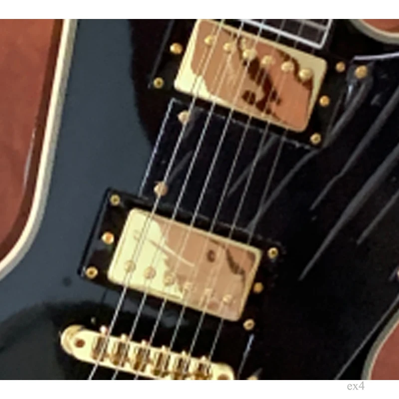 rosewood fingerboard irregular mahogany body and neck, 22 frets, gold hardware shape electric guitar