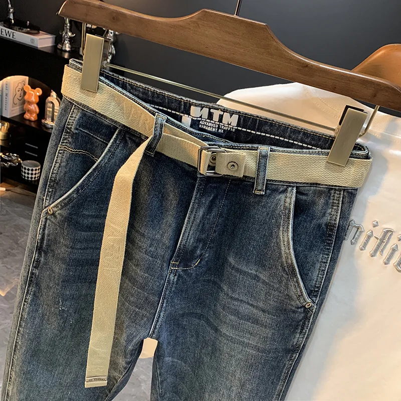 

2025 new slanted pocket casual small leg jeans for men, autumn versatile, slim fit and slimming tapered small leg pants