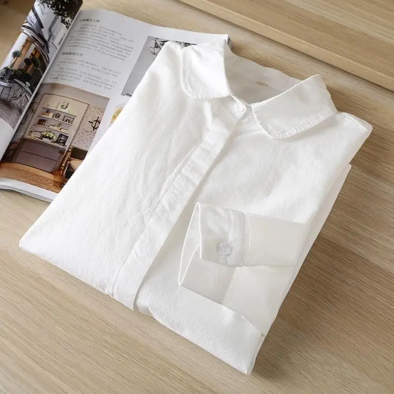 Biała koszula damska z długim rękawem z czystej bawełny, profesjonalna, na wiosnę i jesień, luźna, wyszczuplająca, z ukrytymi guzikami, modna odzież damska.