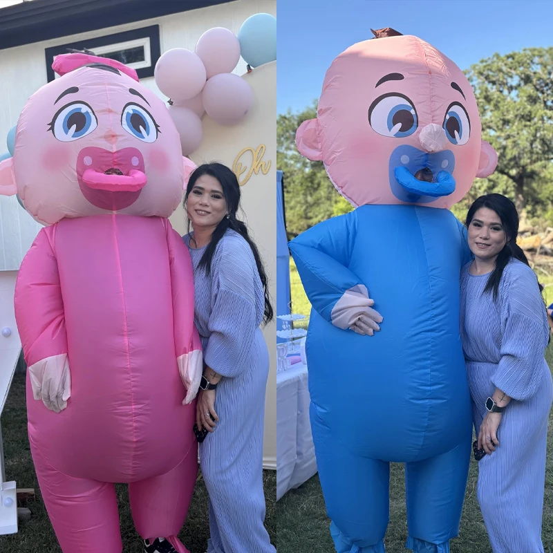 An Adult-Sized Inflatable Baby, In Blue Or Pink — photograph 2