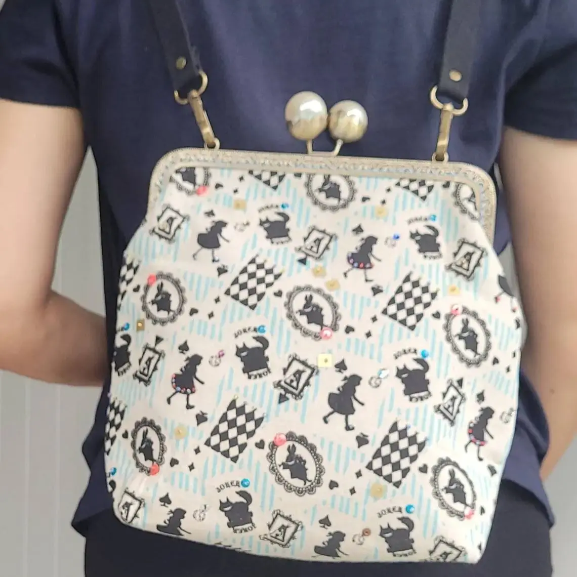 Lost In Vintage convertible kiss lock backpack or crossbody or shoulder bag, metal frame clasp opening, adjustable strap length
