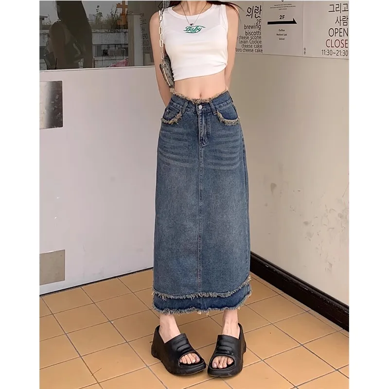 Fashion fringed denim skirt women's 2025 new four season high waist, hip hugging, mid length, slimming A-line skirt