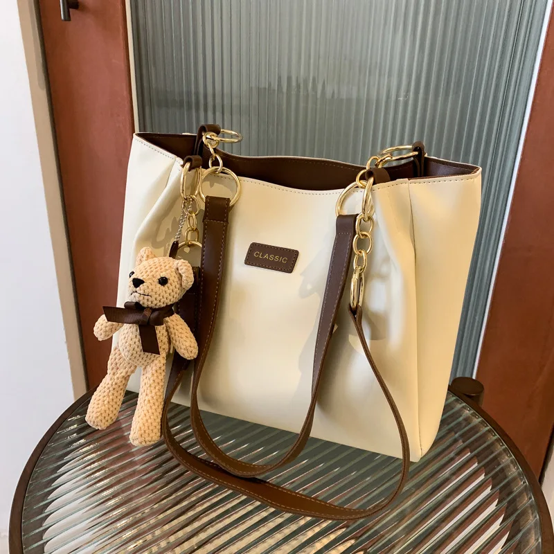 

Genuine leather high-end women's bag 2025 new fashion trend cute pendant large capacity single-shoulder hand tote bag