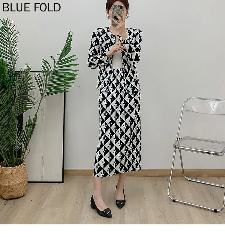 MIYAKE PLEATS Inverno Nuovo Cappotto stampato + Gonna a pieghe Abito sciolto Gonna dritta a pieghe di grandi dimensioni Set di due pezzi Set di gonne