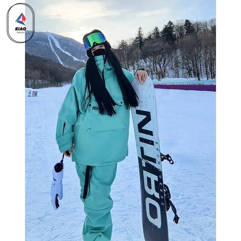 

Windproof Waterproof Ski Suit Set with Fleece Lining Hooded Jacket Pants for Men Women Snowboarding Winter Sports Fashion Outfit