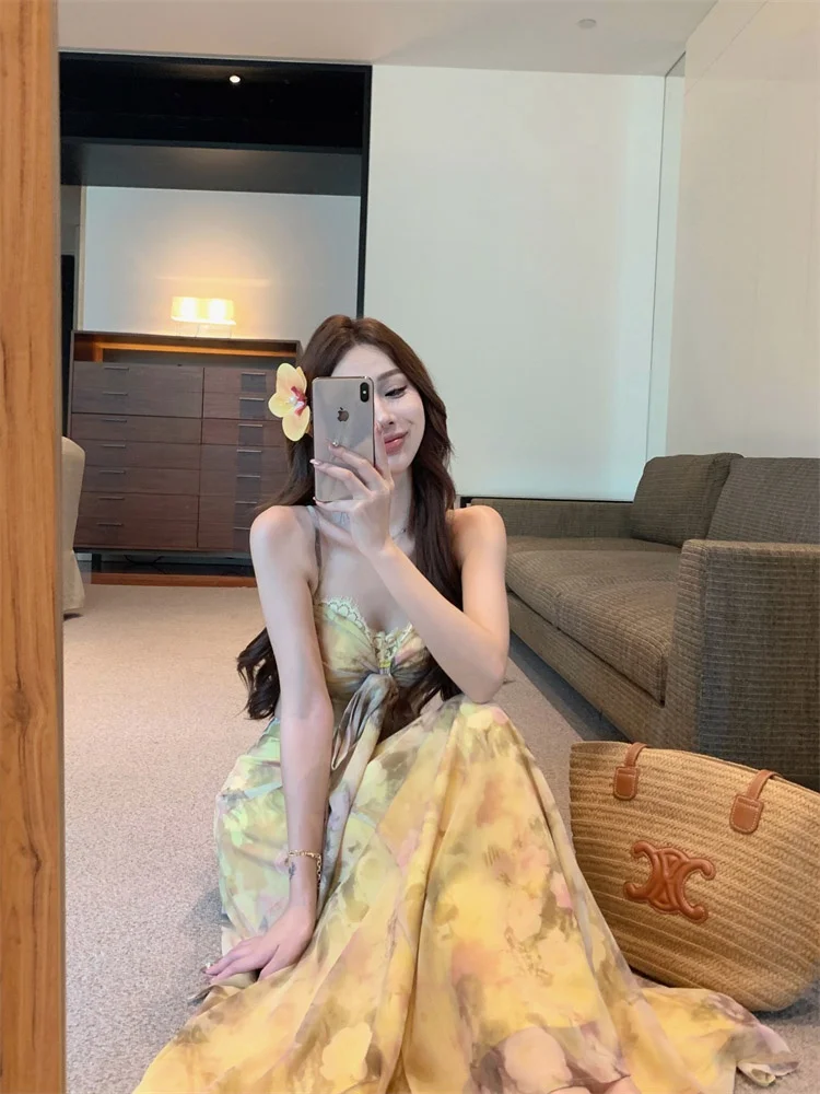 Damska letnia spódnica maxi z wysokim stanem, wyszczuplająca, w stylu koreańskim, z kwiatowym nadrukiem, o kroju litery A, idealna na co dzień i do pracy, kolekcja lato 2025.