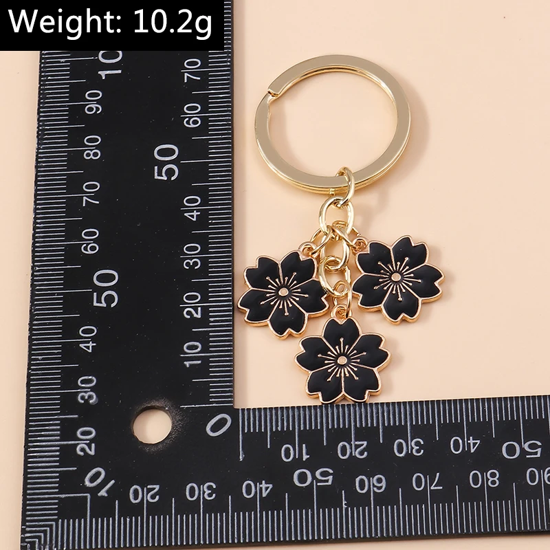 Aihua 40 Farben Niedlicher Pflanzen-Schlüsselanhänger Emaille Sakura-Blumen-Schlüsselanhänger für Frauen Mädchen Handtasche Anhänger Autoschlüsselhalter DIY Schmuck Geschenke – Detail 19