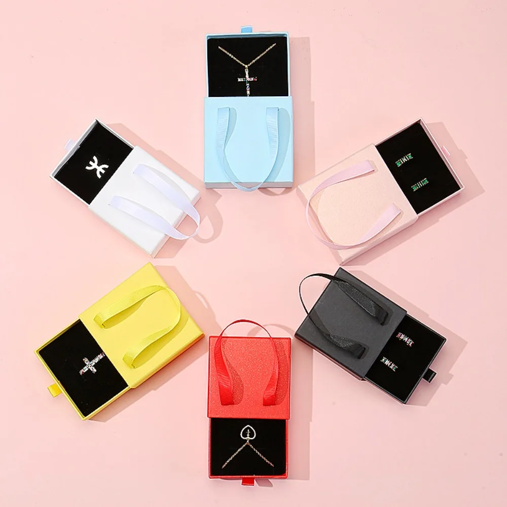 

Cardboard Drawer Jewelry Package Box Ribbon Handle Sliding Gift Box Solid Color With Handle Jewelry Display Box Necklaces