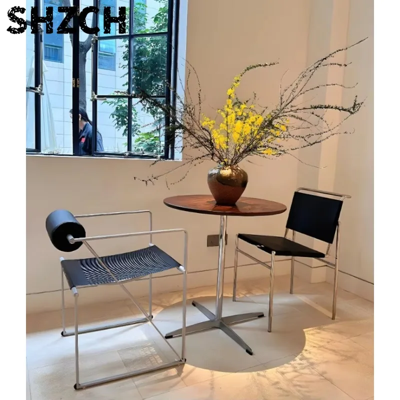 Silladcomedor italianadcuero con sillín, silladrespaldodrestaurantedlujo con luz nórdicadacero inoxidable, sil