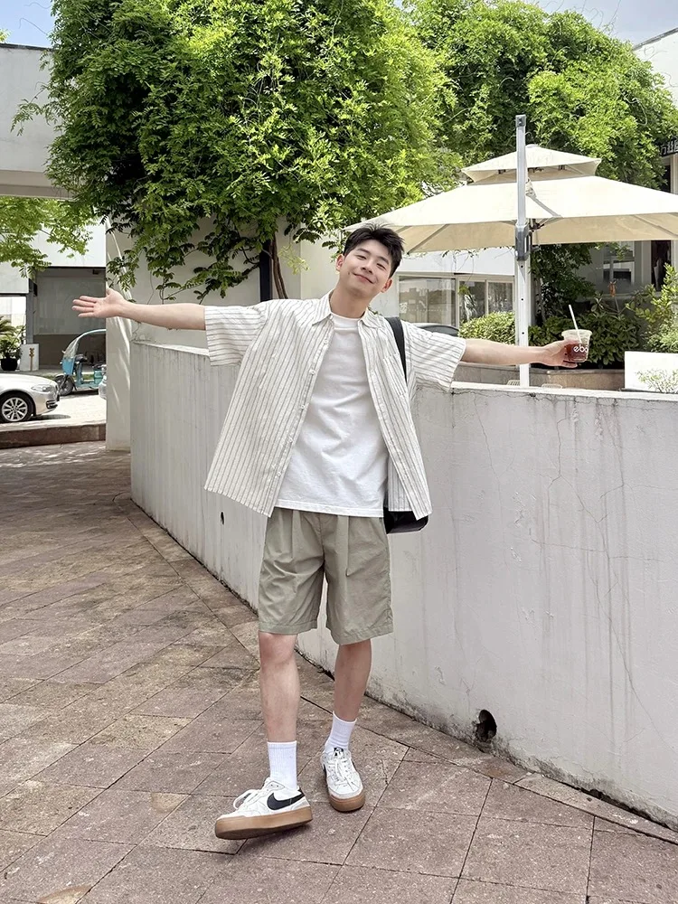 

Korean Sle Men's White Striped ort Sve irt Casual Loose Summer Faionable Top Collar Polyester Fiber Cool Sens...