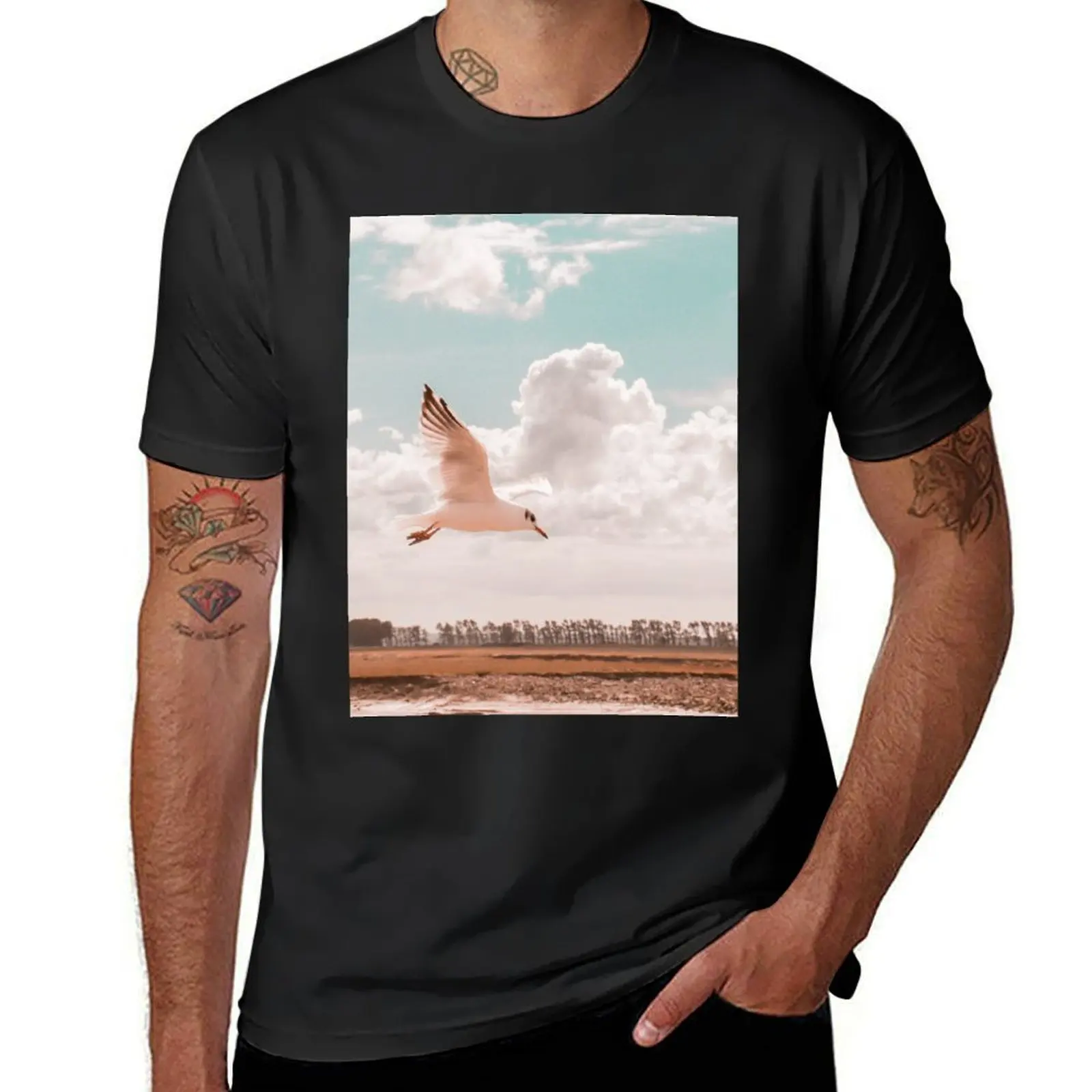 Flying bird at twilight, white seagull, sunset, nature photography, peach and turquoise sky, Landscape T-Shirt