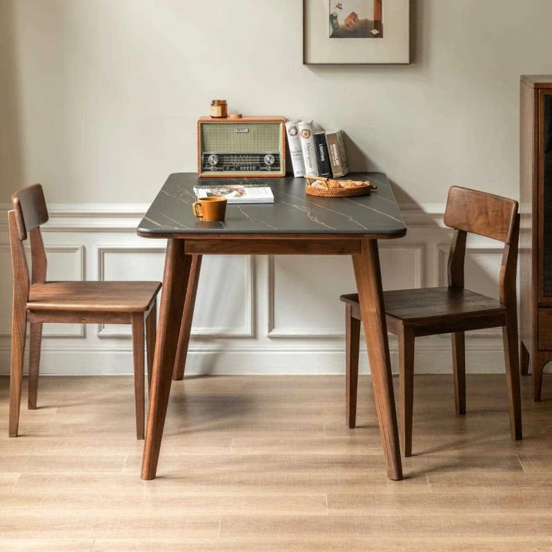 

Black walnut rectangular table Solid wood dining Small apartment black rock slab dining table Modern and simple