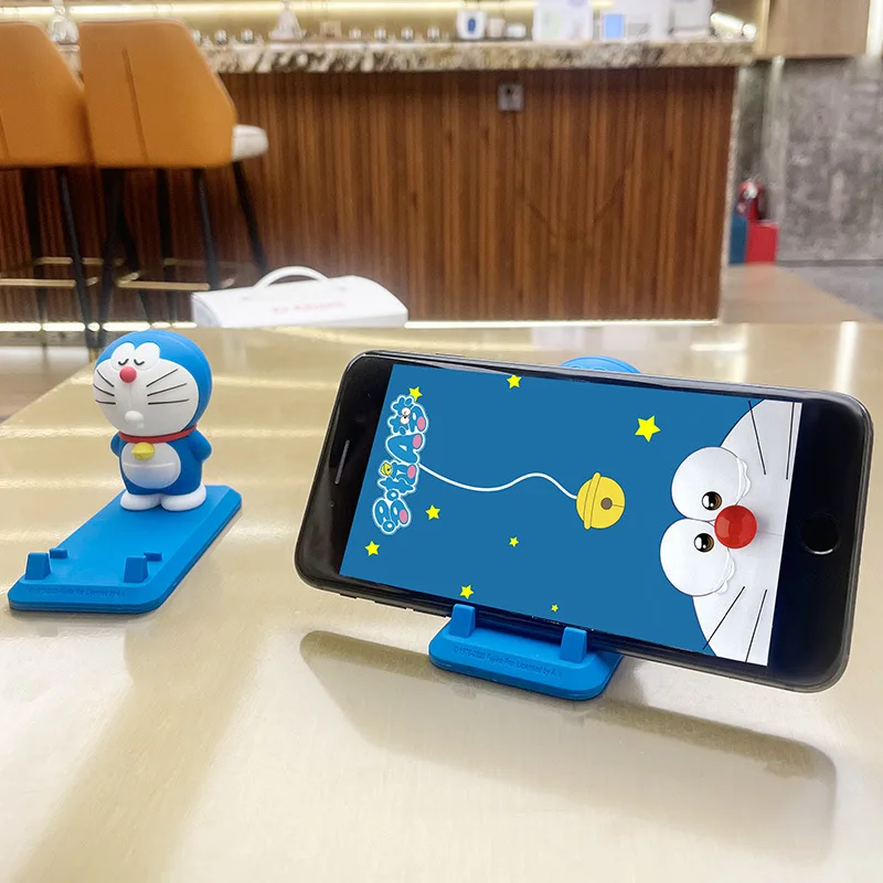 Die Minso Mobile Station verfügt über einen süßen und cartoonischen Schreibtisch für faule Menschen, Telefonständer und exquisite kleine Geschenke