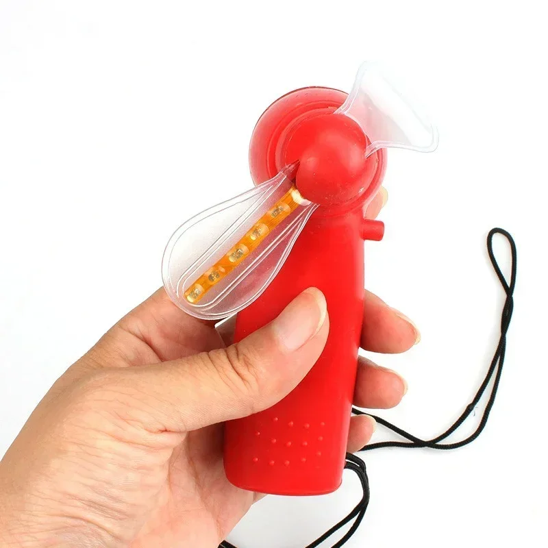 Image of Bunter leuchtender Mini-Ventilator, blinkender Ventilator, leuchtendes Spielzeug, Kinderspielzeug, zufällige Farbe
