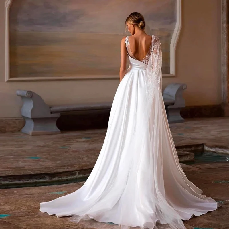 Haute Couture elegante polsino rotatore singolo avorio con Tulle Applique a mano e abiti da sposa a trapezio in raso per donna