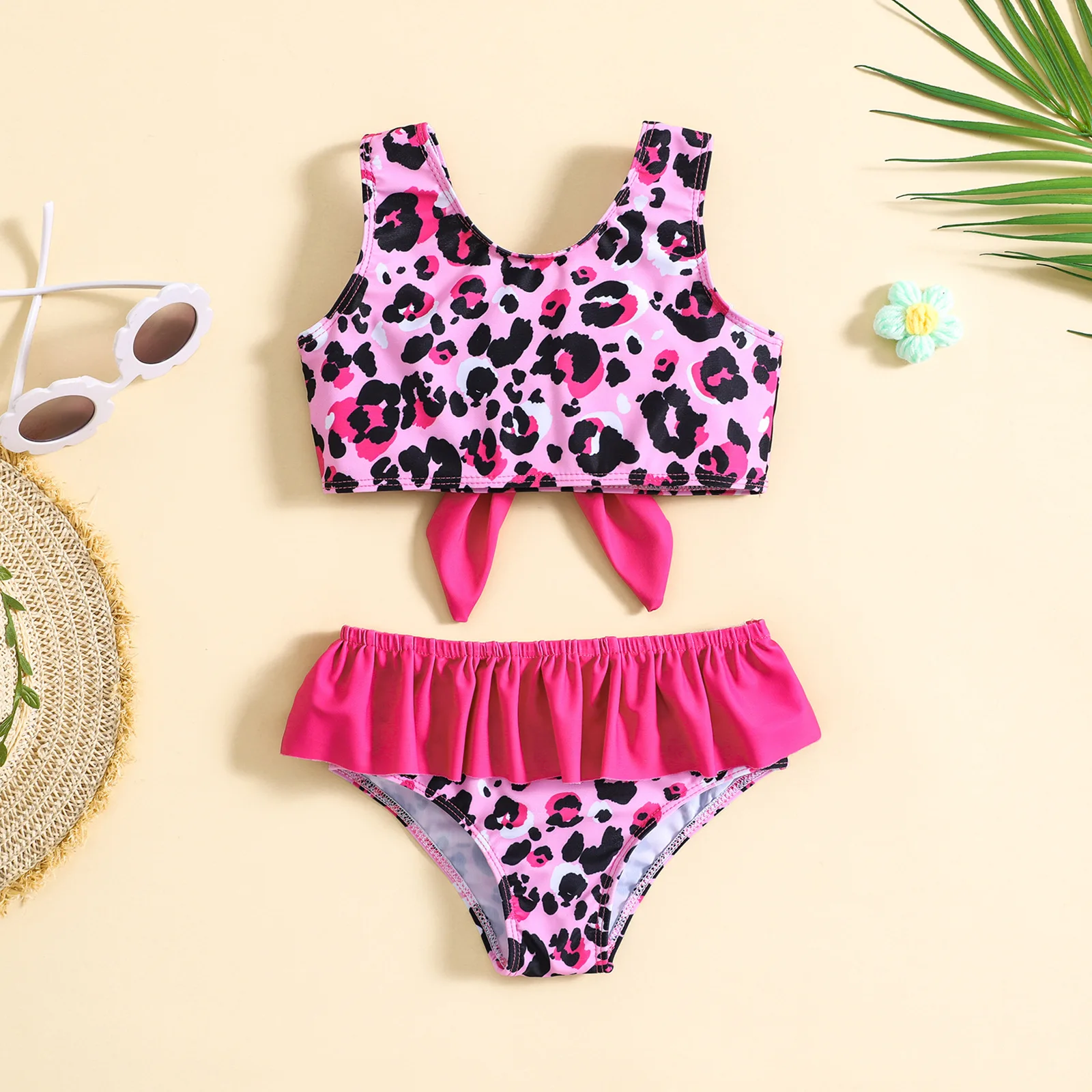 Baby two piece swimsuit with pink leopard print and big bow,skirted bottom,suitable for seaside and pool play