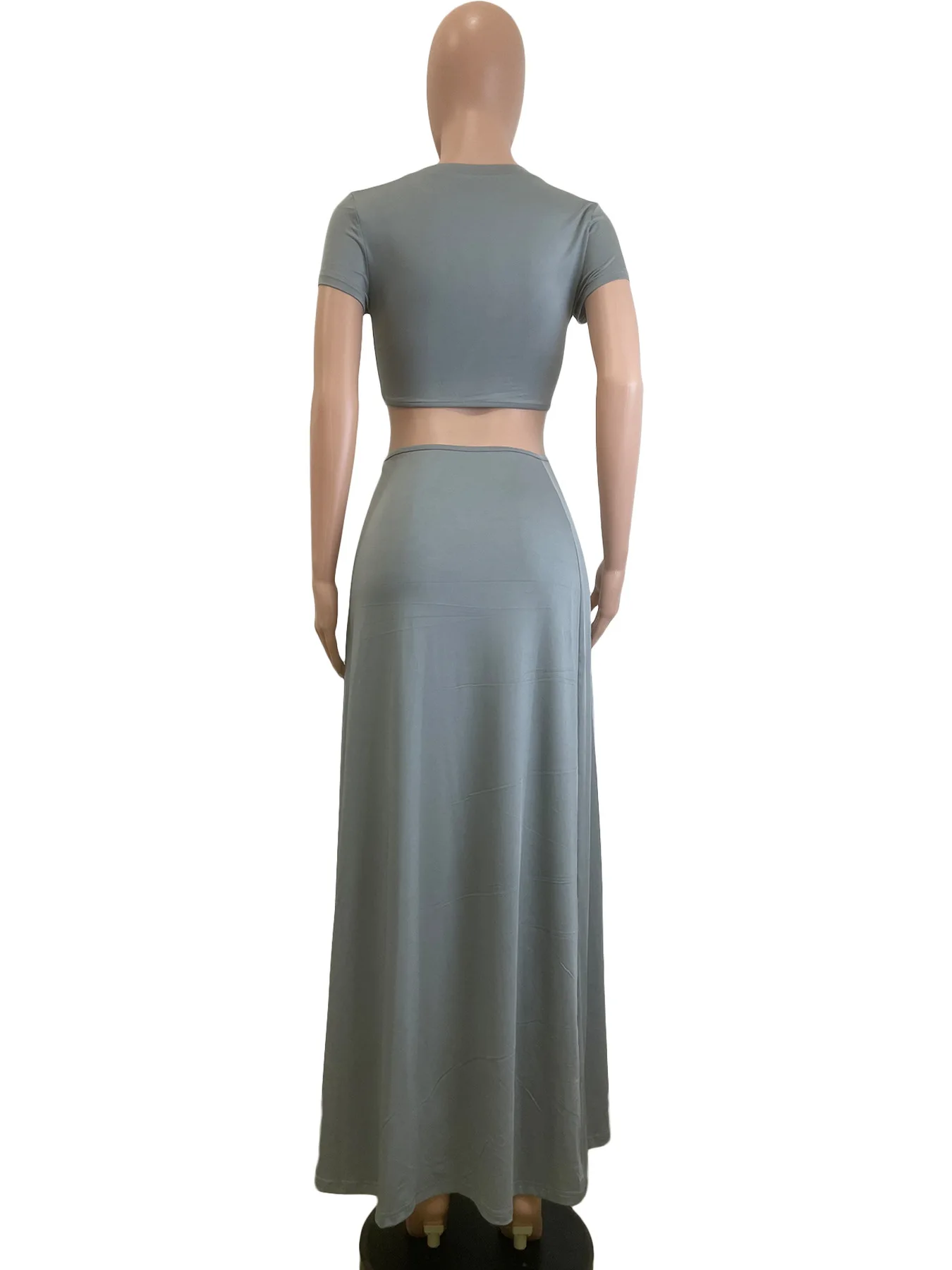 Letni nowy damski zestaw z rozcięciem w klatce piersiowej i odkrytym pępkiem, z krótkim rękawem i długą spódnicą 2025