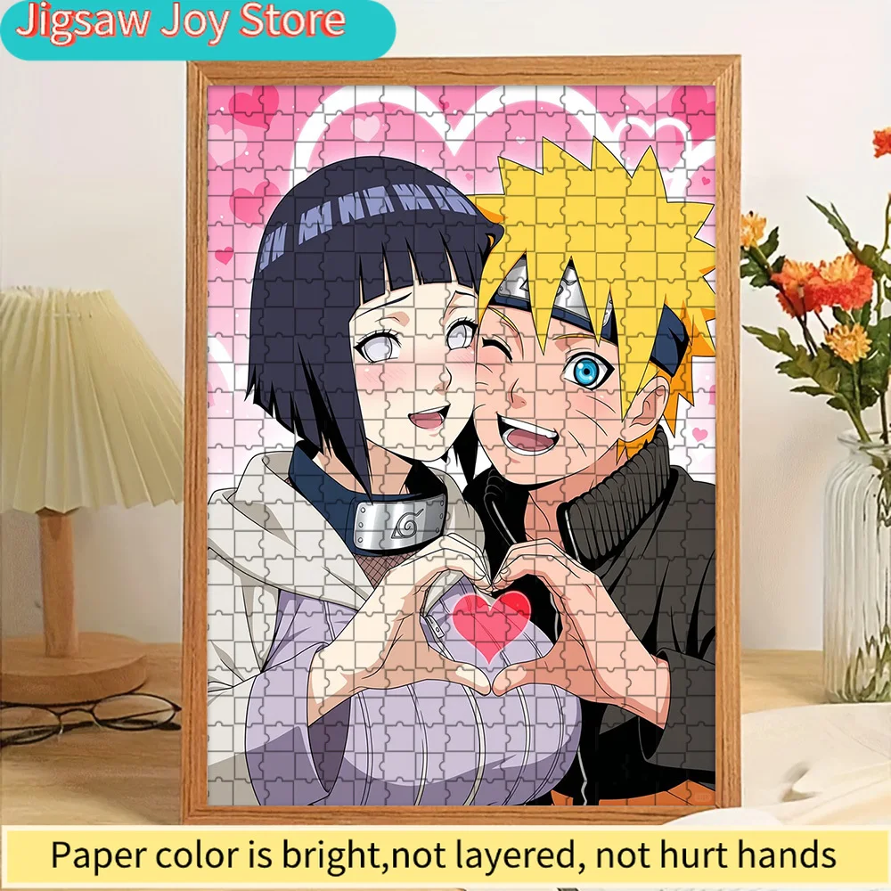 

High Quality Paper Jigsaw Puzzle Anime Naruto Uzumaki and Hinata Hyuga Making Heart Hands with Pink Heart Background and Red Hea