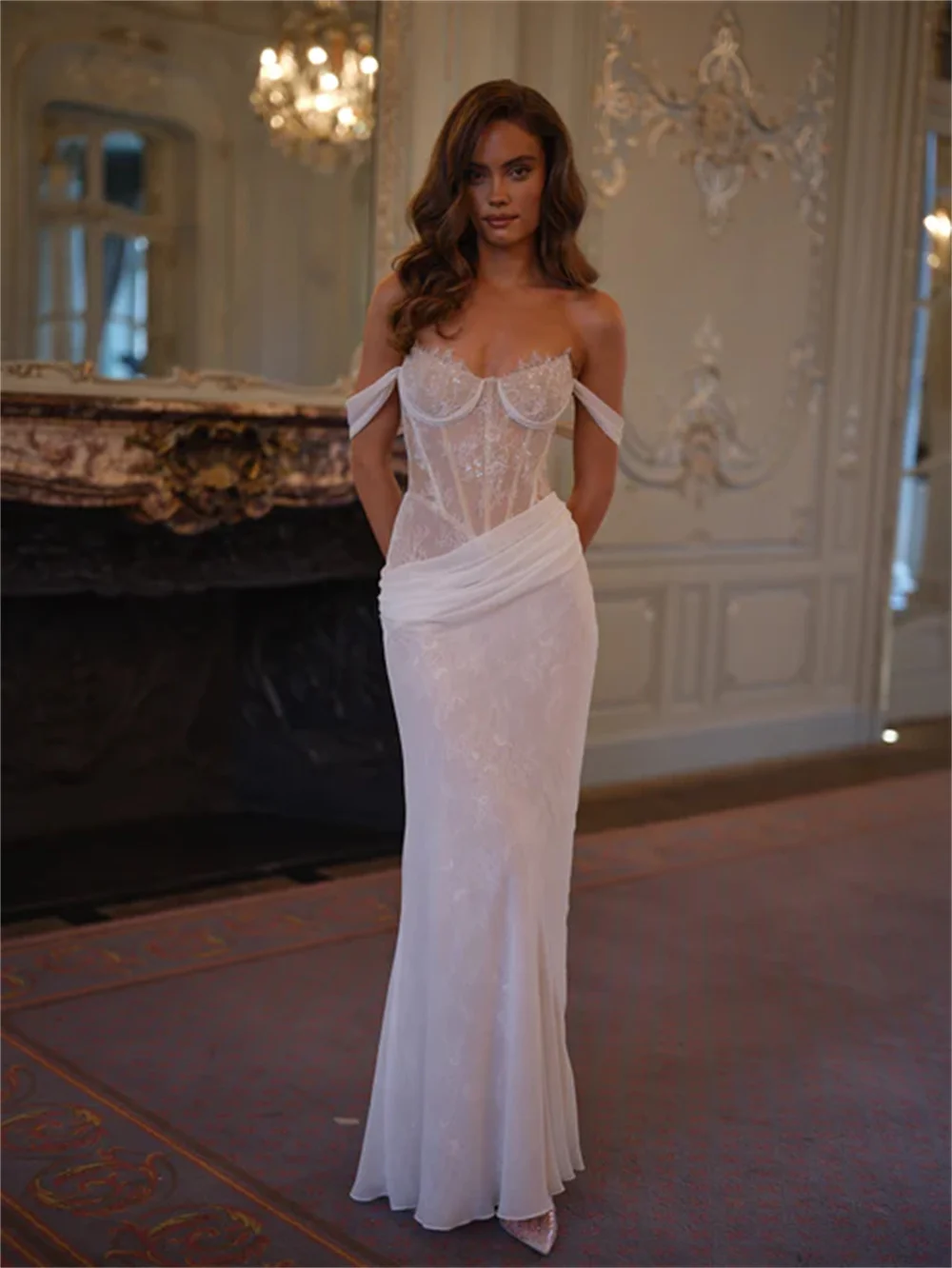 ชุดแต่งงานแบบเรียบง่ายเปิดไหล่ทรงหวานประดับลูกไม้เต็มตัว คอร์เซ็ทสั่งตัดได้ ปี 2026 รุ่น Rode De Morrie