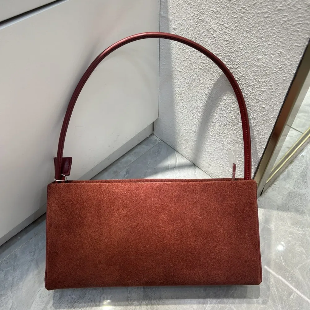 

Fashion Temperament Leather Baguette Bag 2025 Autumn and Winter New Niche Design Matte Cowhide Women's Commuter Armpit Bag
