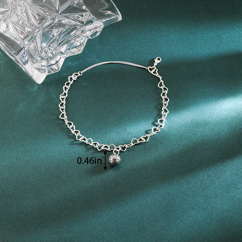 

S925 sterling silver James Avery Light Connected Hearts charm bracelet paired with a football pendant
