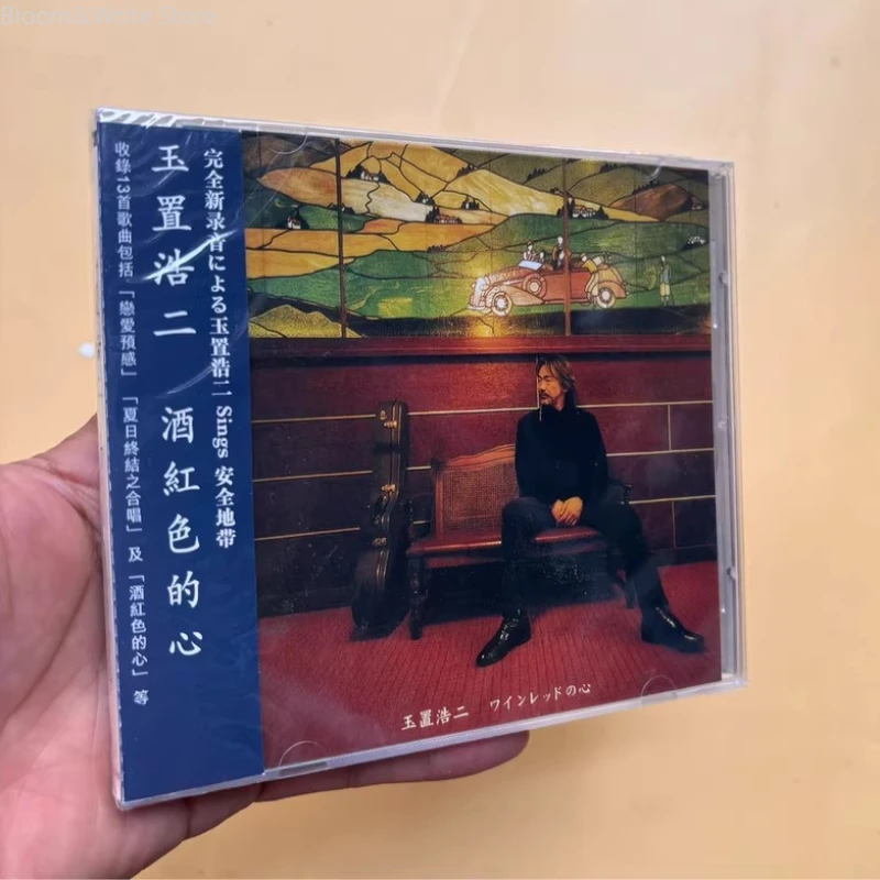 

Коджи Тамаки: Винно-красный CD-альбом с классическими японскими поп-песнями, шелковистым вокалом и эмоциональными мелодиями, созданный для любителей музыки.