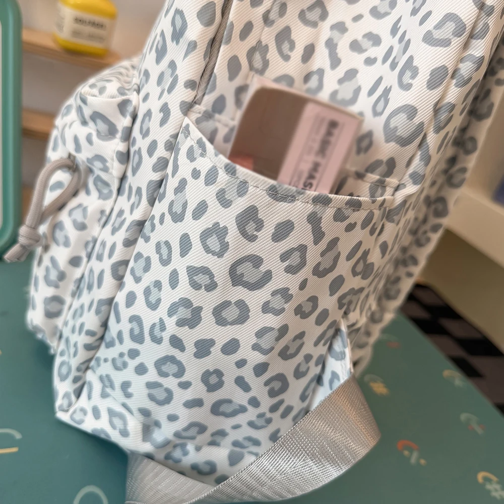 Leopard Print Backpack Casual Daypack Leopard Pattern Multi Pocket Soft Nylon Rucksack for Daily Stroll Weekend Outing Street Sh