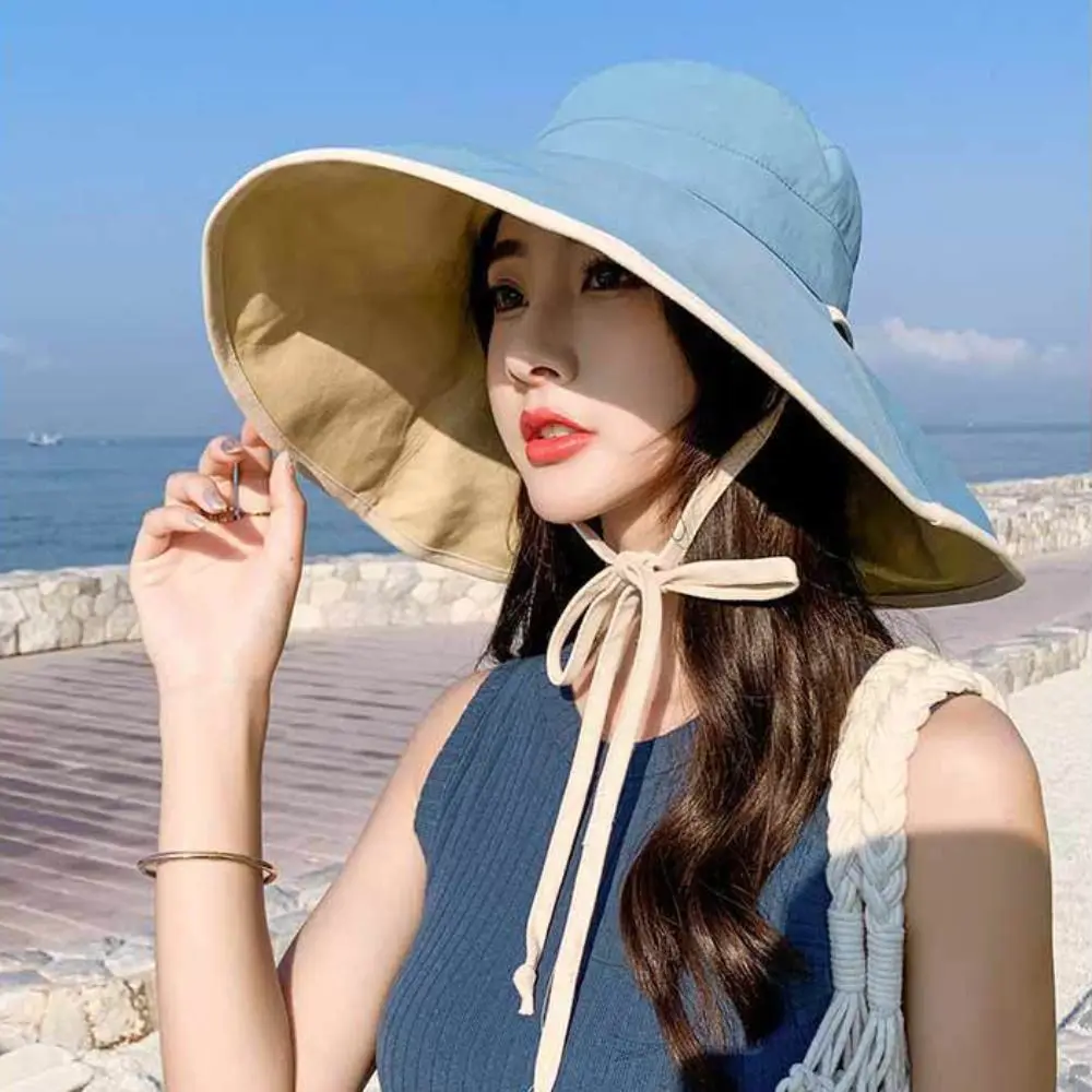 Sombrero de sol de ala ancha de Color sólido, sombrero de protección solar Anti-UV de estilo coreano, sombrero de pescador con cuerda para el cuello, sombrero de cubo para mujer