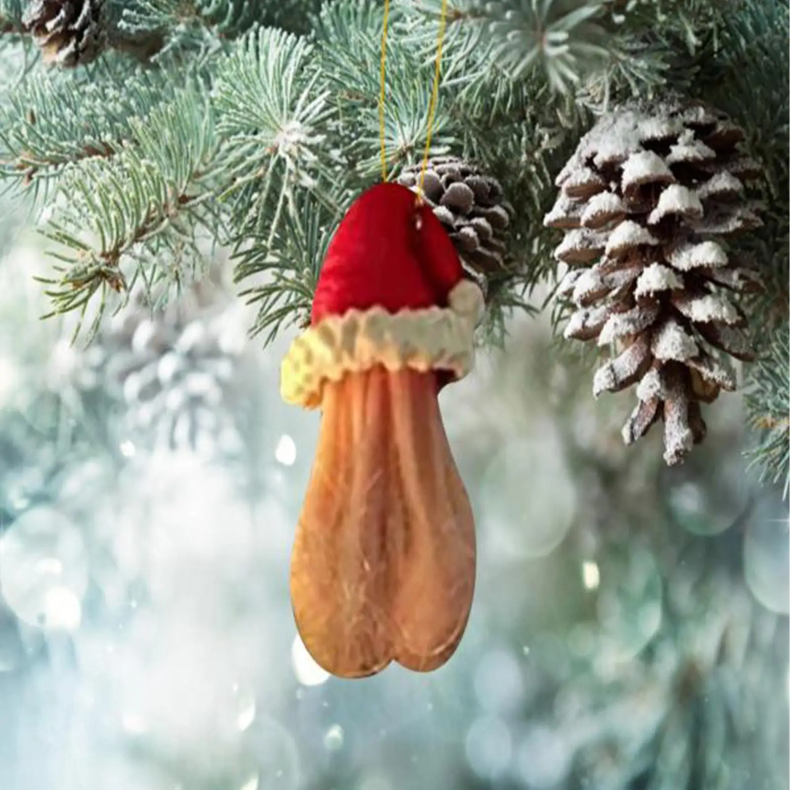 Close-up of the hand-finished Santa hat detail on the resin egg ornament