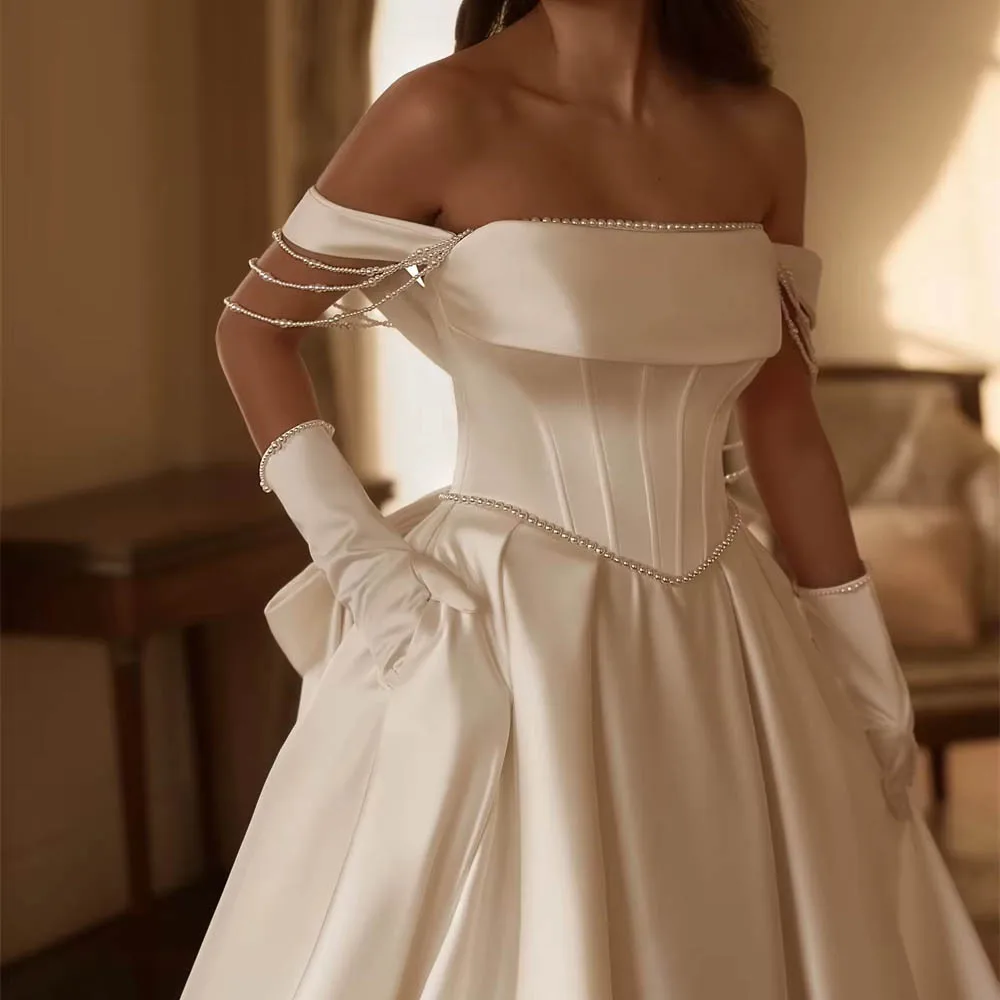 فستان زفاف رائع من الساتان الأبيض مخصص بدون حمالات بفيونكة فيستدو دي نوفيا عالي الجودة بسحاب خلفي فستان زفاف #3