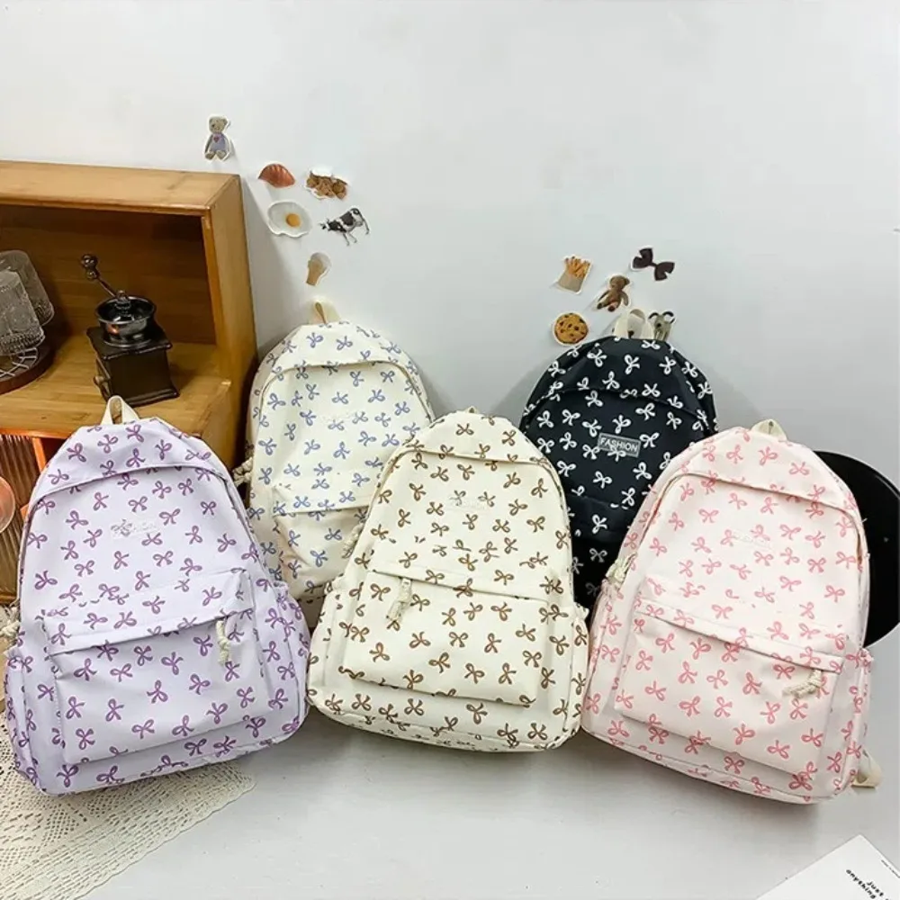 

Портативный студенческий рюкзак с бантом и принтом, большой вместительный женский рюкзак с регулируемым ремнем, нейлоновый женский школьный рюкзак для улицы