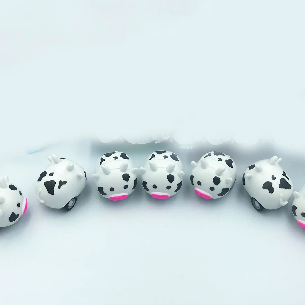 12 個のレトロなバックカー子供用慣性車両ミニ慣性動物明るい漫画デザイン子供の遊びパーティーの記念品