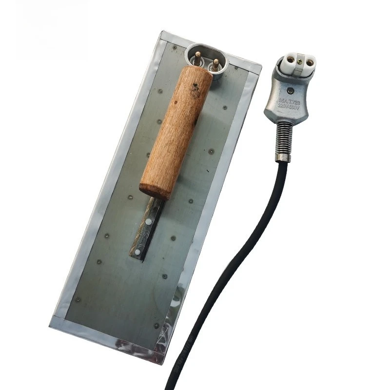 Plastic track particle paving tool, heated trowel