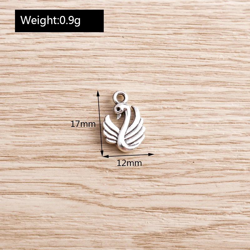 Tusember 50 Stück Legierungs-Tieranhänger Taube Katze Schwan Schmetterling Dinosaurier Muschel-Anhänger für Armbänder Halsketten DIY Schmuckherstellung – Detail 4
